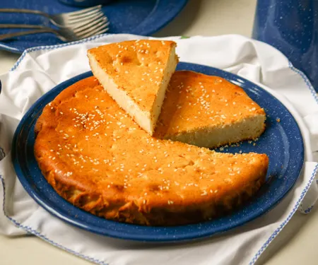 Salvadoran Quesadilla (Sweet Cheese Breakfast Cake) with sesame seeds