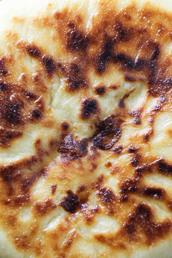 Imeruli Khachapuri - Georgian cheese filled bread texture close up