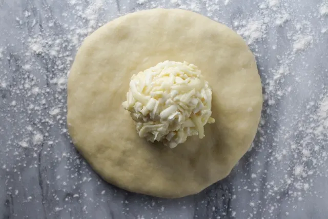 Step 2 - Imeruli Khachapuri - Georgian cheese-filled bread - flattened dough with ball of filling on top