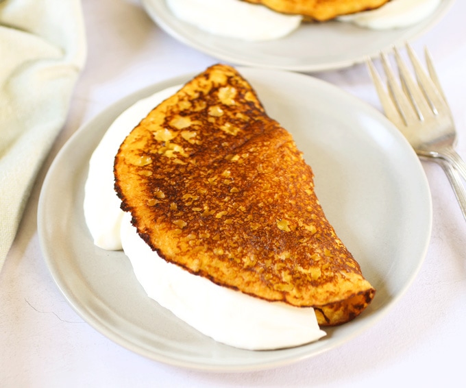 Cachapas (Venezuelan corn pancakes) with soft cheese