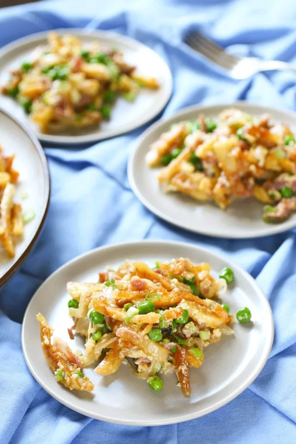 Revuelto Gramajo (Argentinian Scrambled Eggs and Potatoes) plated serving vertical image