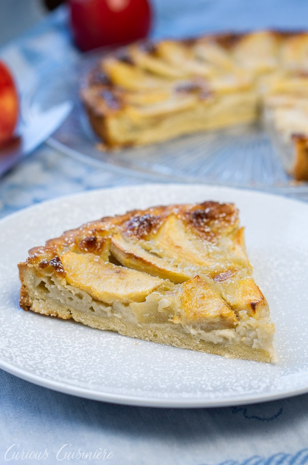 Slice of Tarte Normande (French Apple Tart)