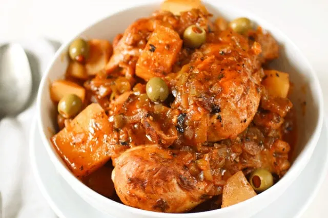 Cuban Chicken Fricassee with chicken, peas, and potatoes