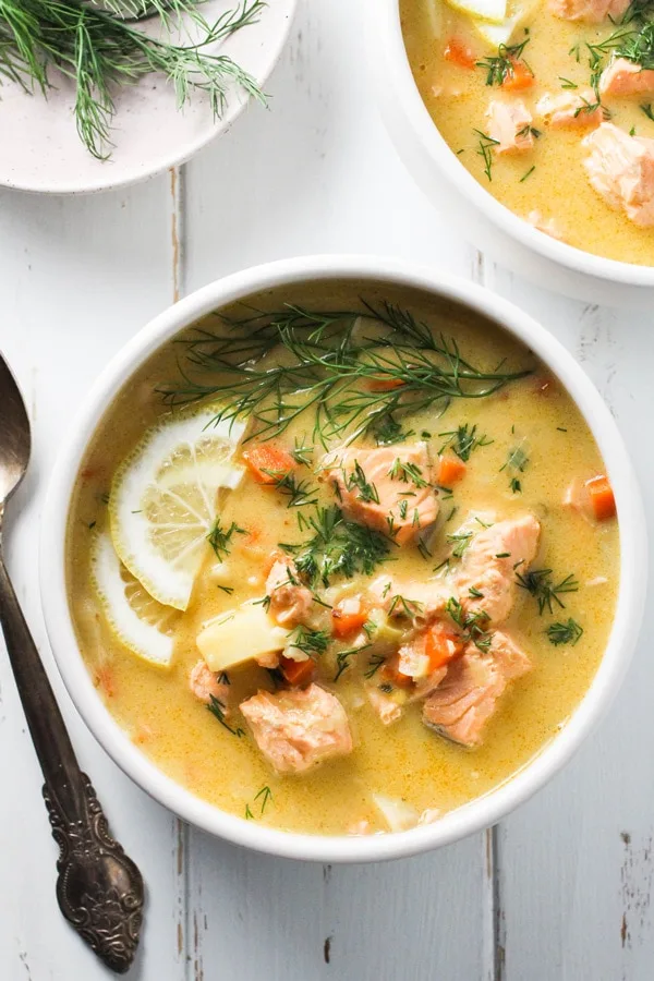 Finnish Salmon Soup - Lohikeitto in a bowl with lemon garnish