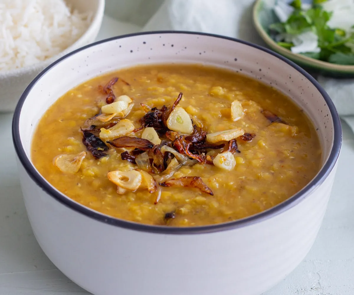 Masoor Dal - Red Lentil Curry topped with garlic and onions