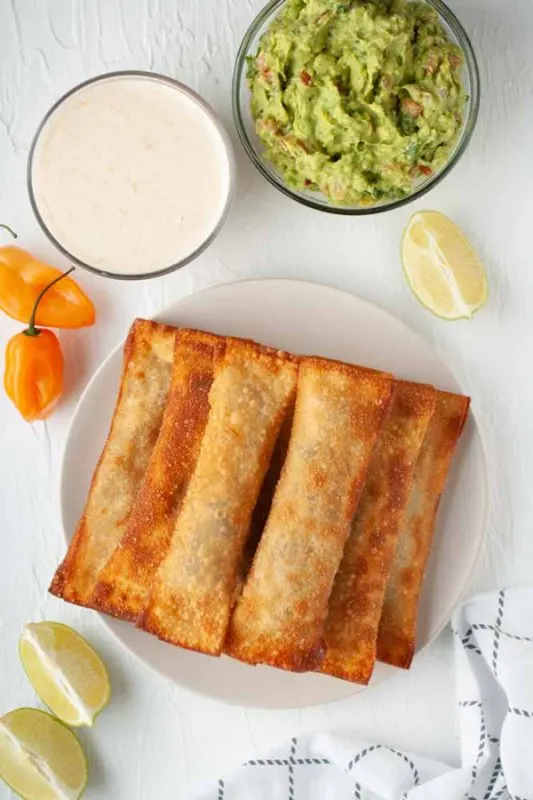 Peruvian Beef Tequenos with guacamole and spicy sauce