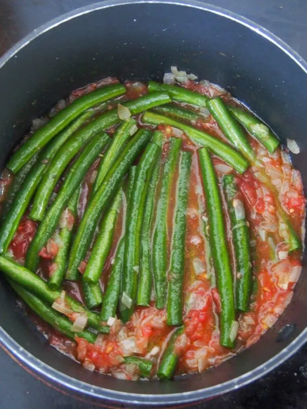Adding beans to Fasolakia - Greek Green Beans