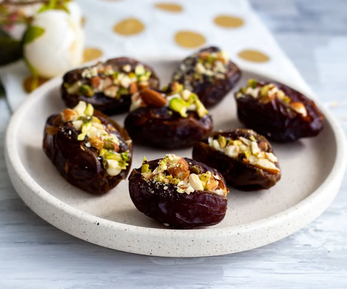Stuffed Dates with cream cheese topped with nuts