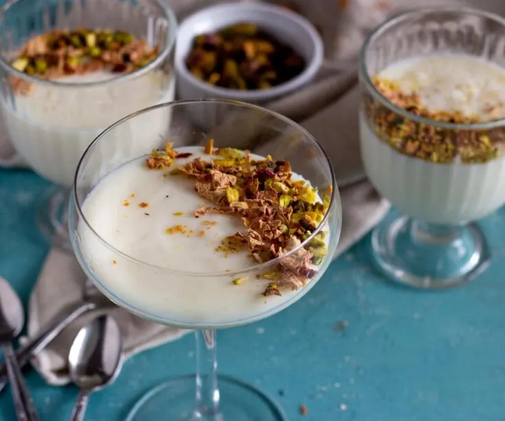 Mahalabia - Middle Eastern milk pudding topped with nuts and rose petals