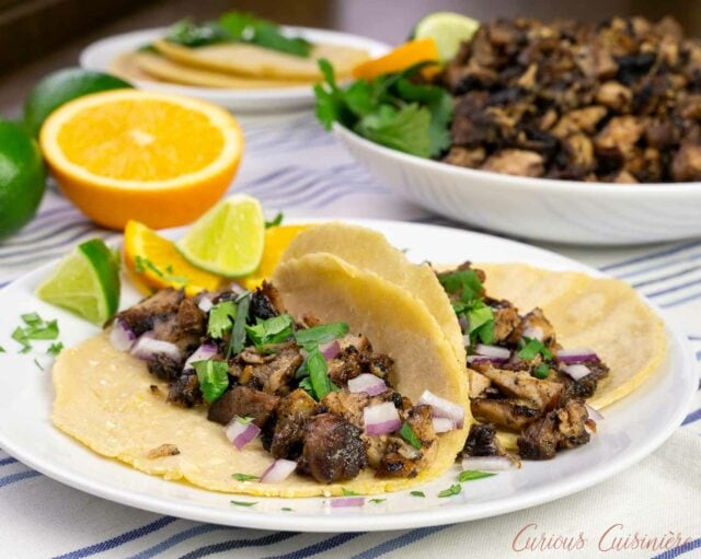 Mexican Carnitas -Slow Cooked Pork Shoulder tacos with onion