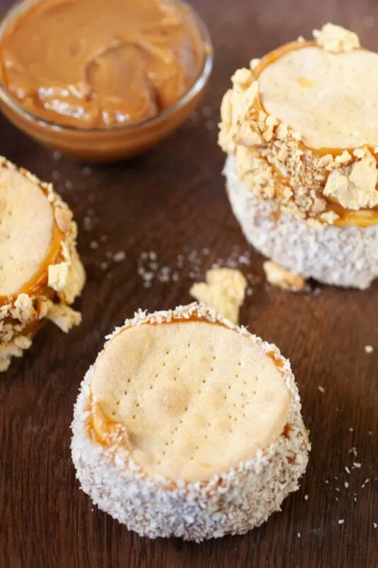 Chilenitos - Chilean Dulce de Leche sandwich cookies - rolled in coconut