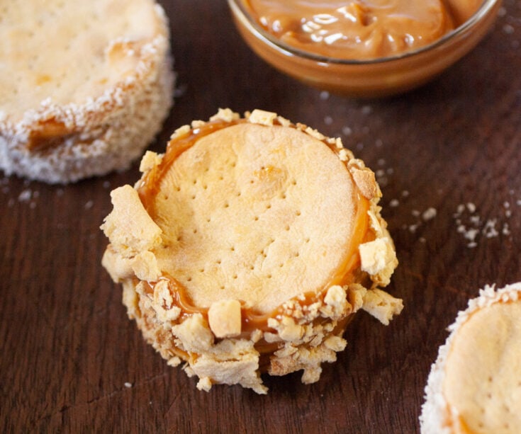 Chilenitos - Chilean Dulce de Leche sandwich cookies rolled in cookie crumbs