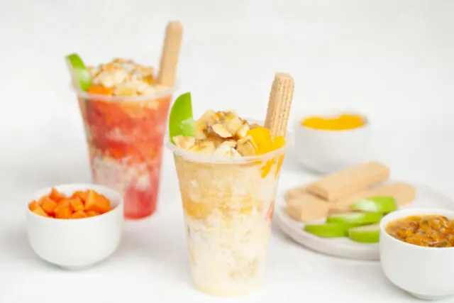 Cholados - Colombian shaved ice with fruit and condensed milk - with fruit toppings