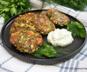 Kolokithokeftedes (Greek Zucchini Fritters) with herbs and feta