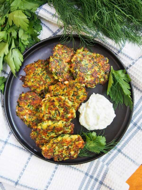 Kolokithokeftedes (Greek Zucchini Fritters) with dipping sauce