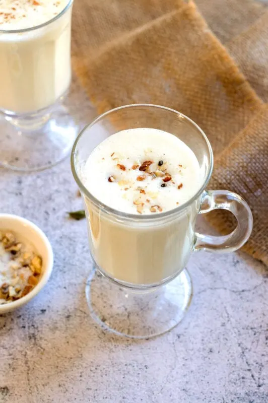 Sweet Lassi topped with almonds and pistachios