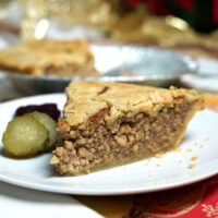 Tourtiere French Canadian Meat Pie slice on plate