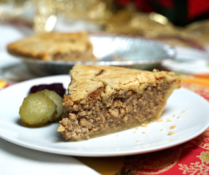Tourtiere French Canadian Meat Pie slice on plate