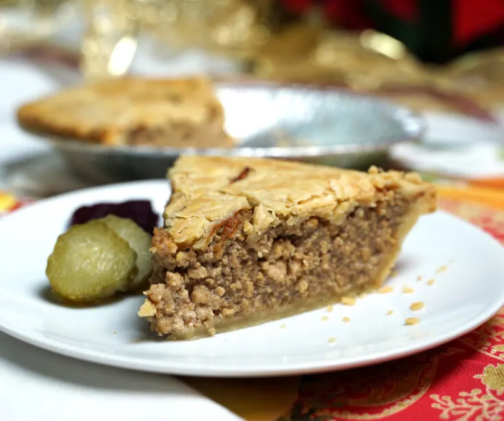 Tourtiere French Canadian Meat Pie slice on plate