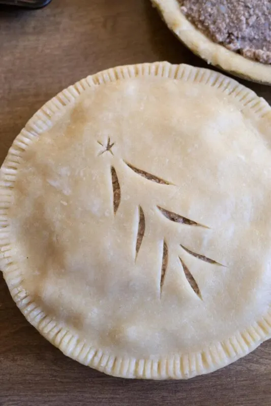 Tourtiere French Canadian Pork Pie with top crust before baking