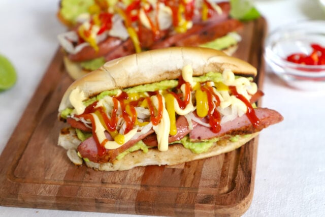 Guatemalan Shucos Hot Dogs with guacamole and sausage
