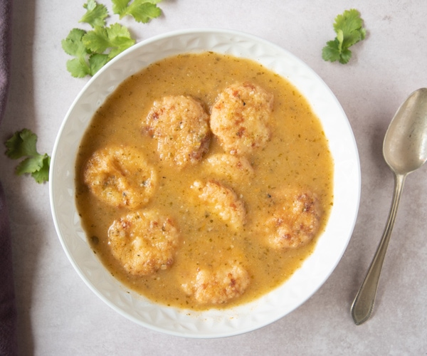 Bowl of Honduran Sopa de Capirotadas (Dumpling Soup) close up