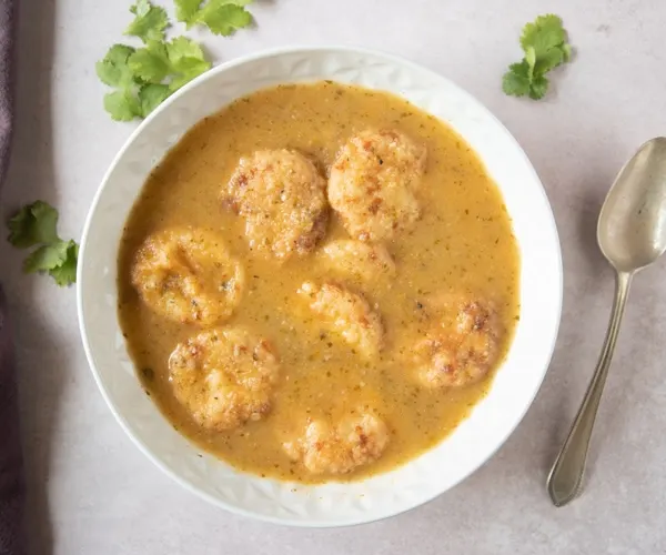 Bowl of Honduran Sopa de Capirotadas (Dumpling Soup) close up