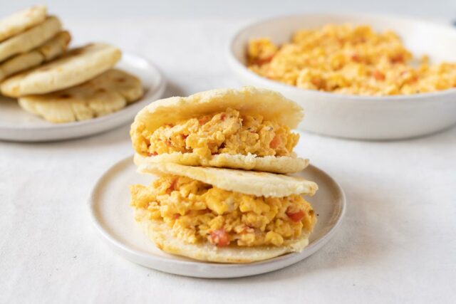 Perico - Venezuelan scrambled eggs with vegetables served in arepas