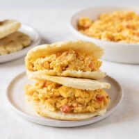 Perico - Venezuelan scrambled eggs with vegetables served in arepas