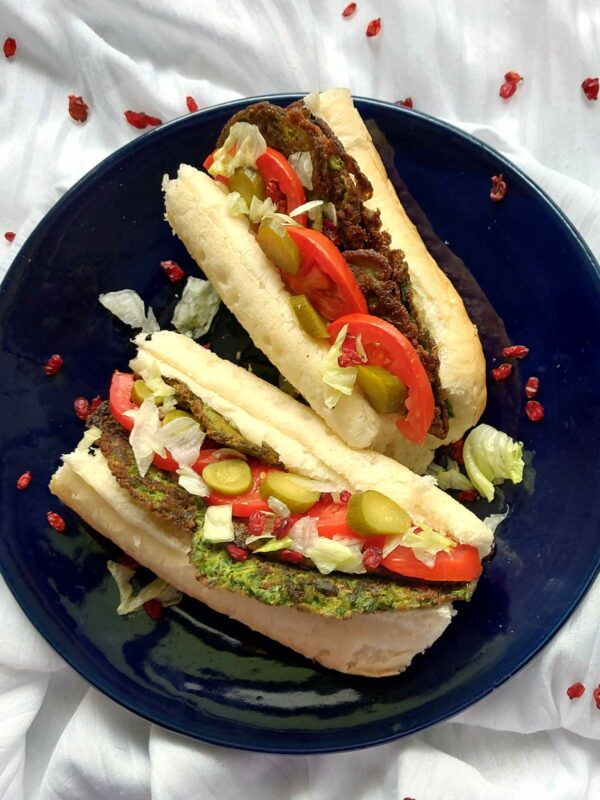 Kuku Sabzi - Persian Herb Omelettes in a sandwich with sauce
