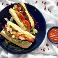 Kuku Sabzi - Persian Herb Omelettes in a sandwich with sauce