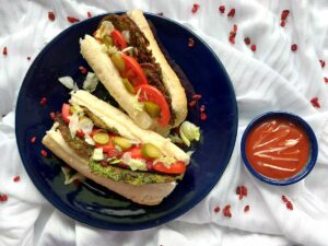 Kuku Sabzi - Persian Herb Omelettes in a sandwich with sauce