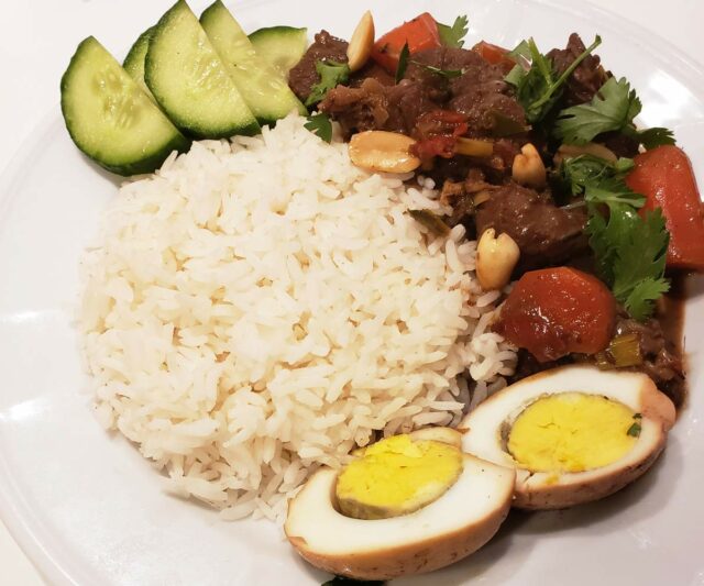 Thai Massaman Curry with hard boiled egg and cucumber