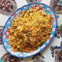 Estanboli Iranian tomato rice served for a meal