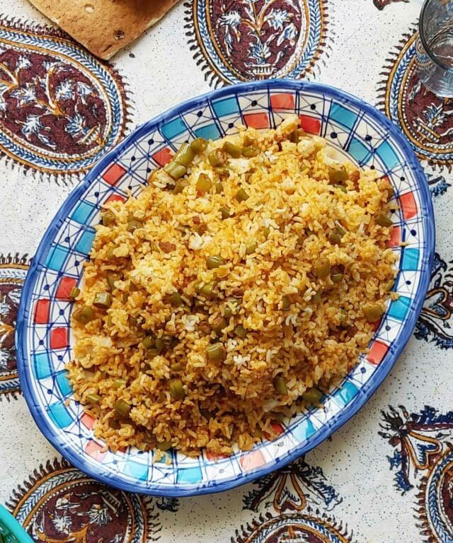 Estanboli Iranian tomato rice served for a meal vertical crop