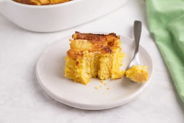 Chipa guasu Paraguan cornbread pudding with cheese eaten with a fork