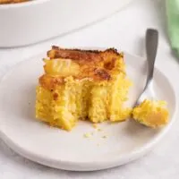Chipa guasu Paraguan cornbread pudding with cheese eaten with a fork