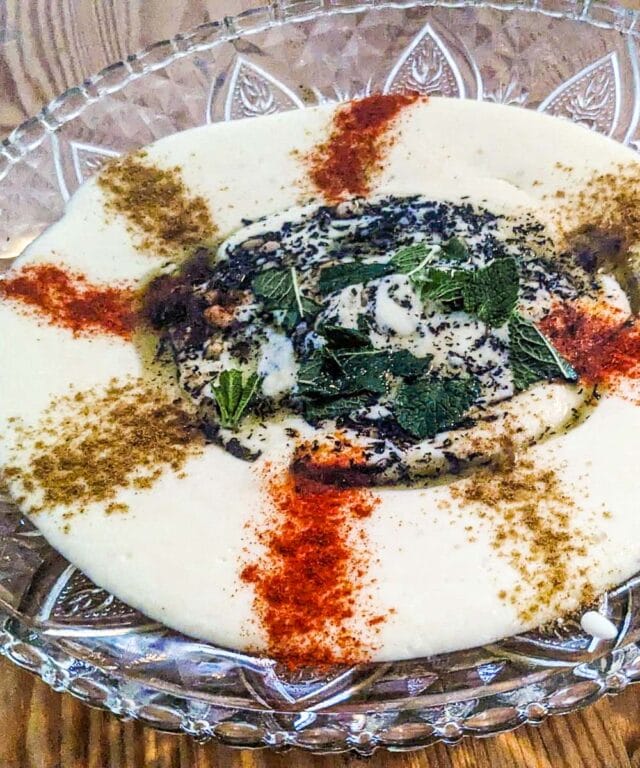 Alawi Msabbaha - potato yogurt dip topped with herbs