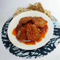 Iranian shami kebab with tomato sauce