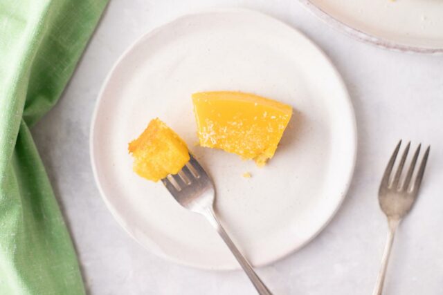 quindim brazilian coconut custard - egg custard piece on a plate