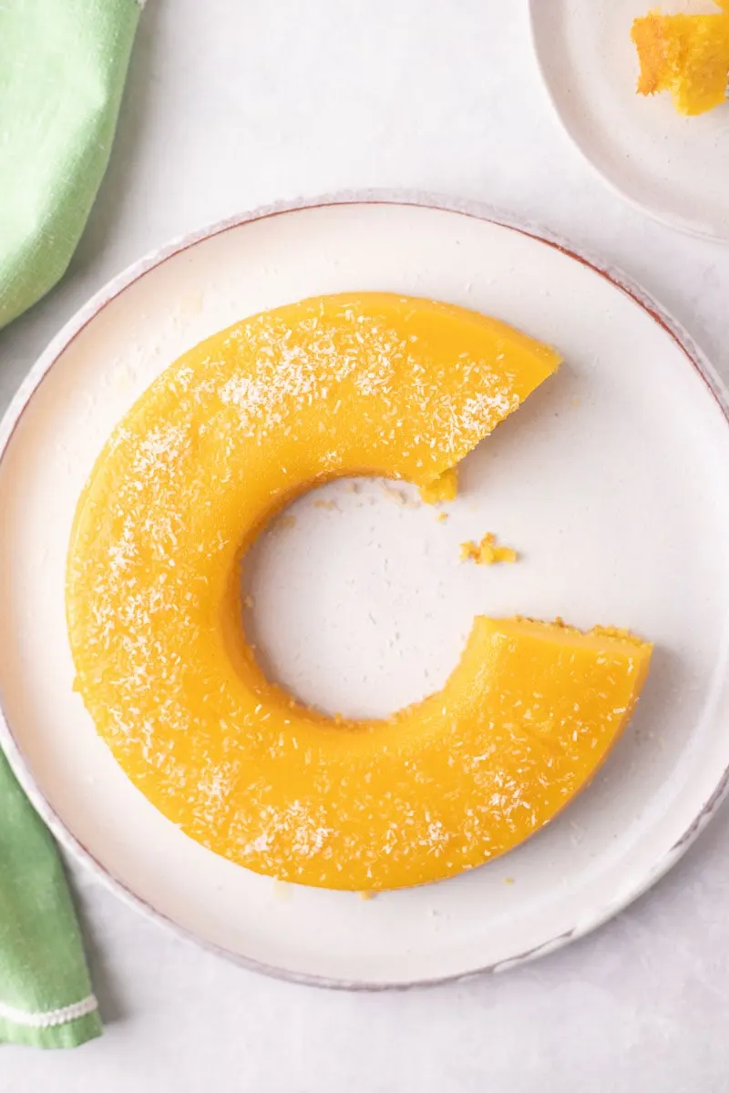 quindim brazilian dessert coconut custard with slice taken out