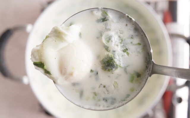 Poaching eggs for Changua Colombian Egg Breakfast Soup