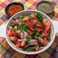 Piyaz Turkish White Bean Salad served with oregano and Aleppo pepper
