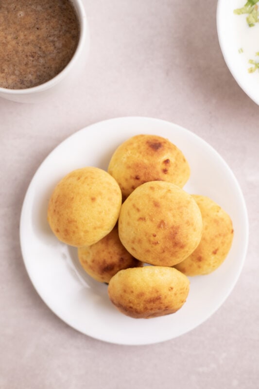 Almojabana -- Colombian cheese bread served with Colombian hot chocolate