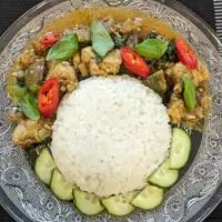 Cha Kroeung Pailin (Cambodian Lemongrass Chicken) with rice and lemongrass crop image