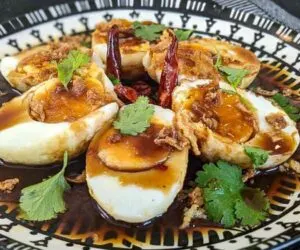Son-in-Law eggs (Kai Luk Koey) - Thai fried hard boiled eggs with sweet and salty sauce