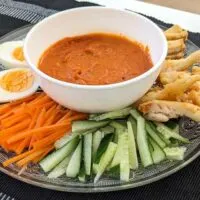 Pasembur (Malaysian Indian Rojak) salad with cucumber and carrots - before mixing with creamy dressing