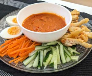 Pasembur (Malaysian Indian Rojak) salad with cucumber and carrots - before mixing with creamy dressing